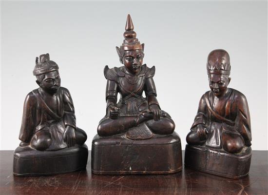 Three Thai carved hardwood figures, 19th century, 18cm - 23.5cm